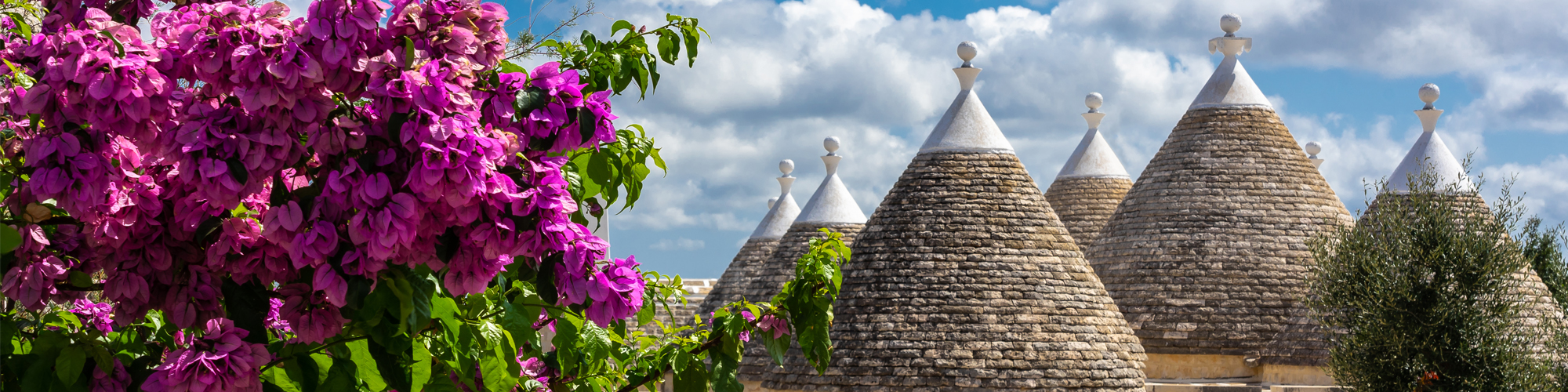 Foto: steinerne Rundhäuser in Apulien – sogenannte "Trulli"